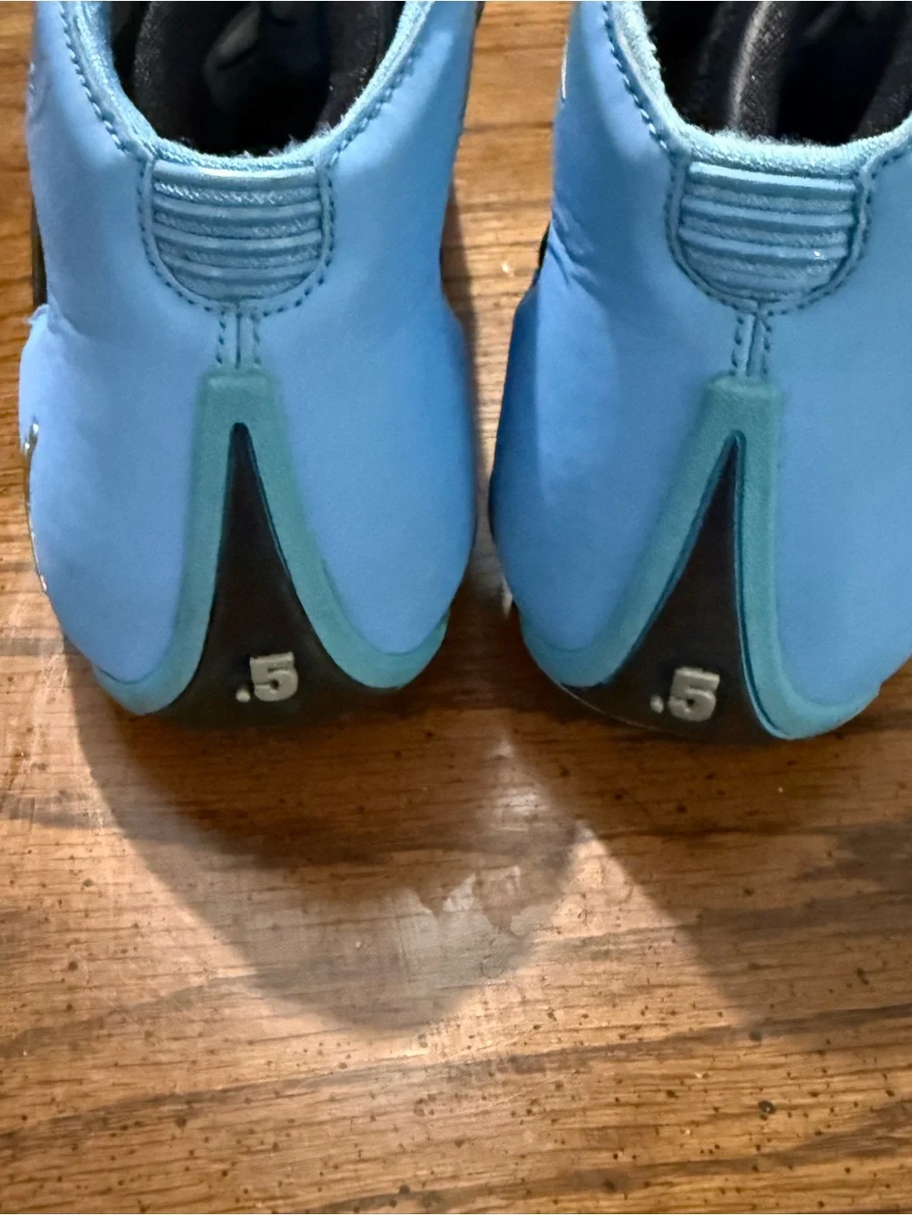 Kids Nike Melo 1.5 shoes black/university blue.
